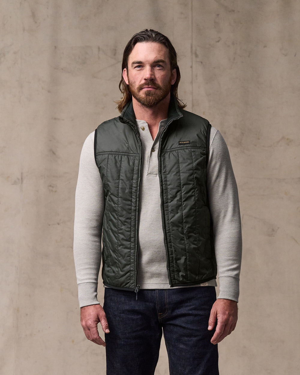 image of a model wearing Filson's Ultralight Vest - Raven