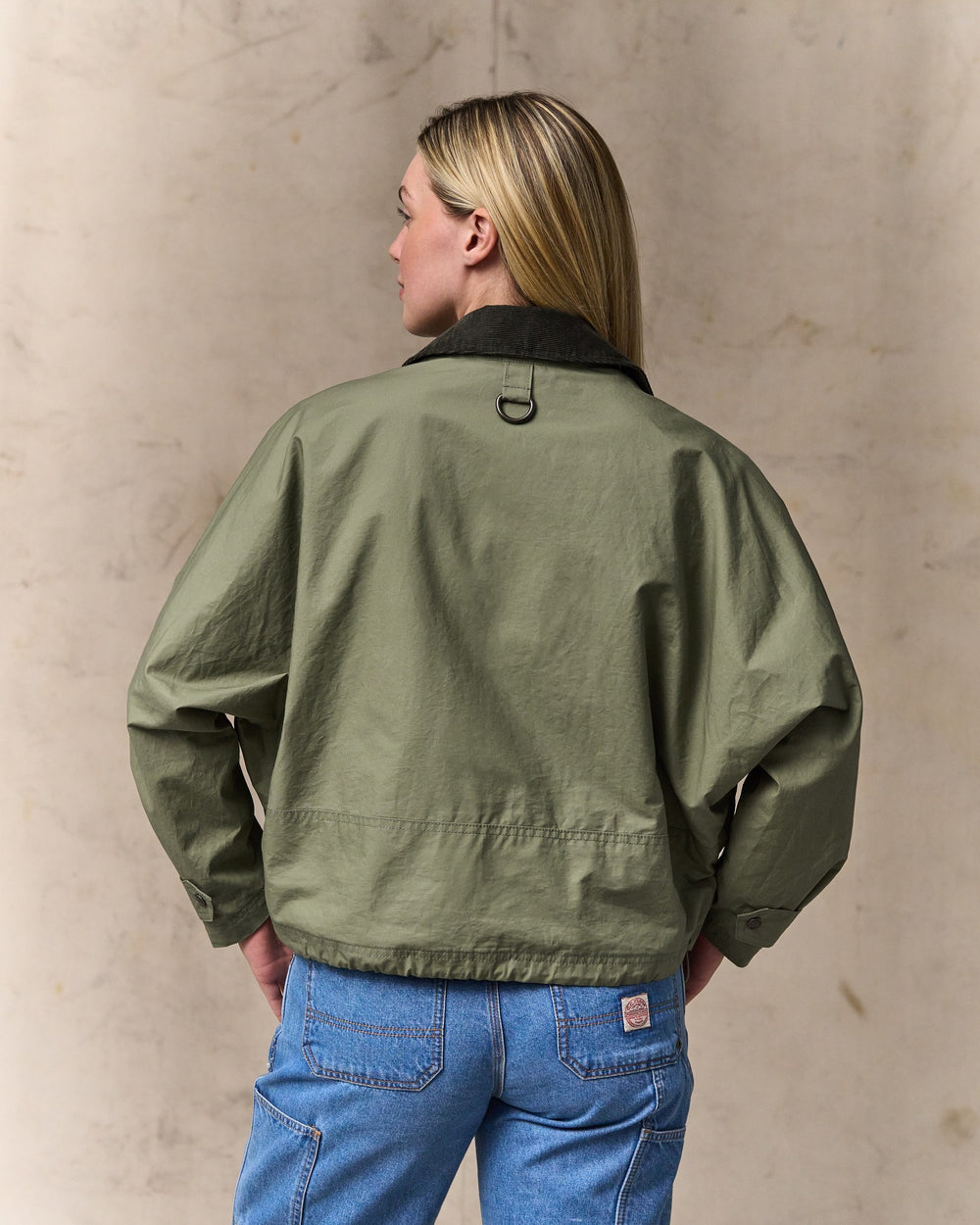 image of a model wearing Filson's Women's Dry Wax Short Work Jacket - Slate Olive