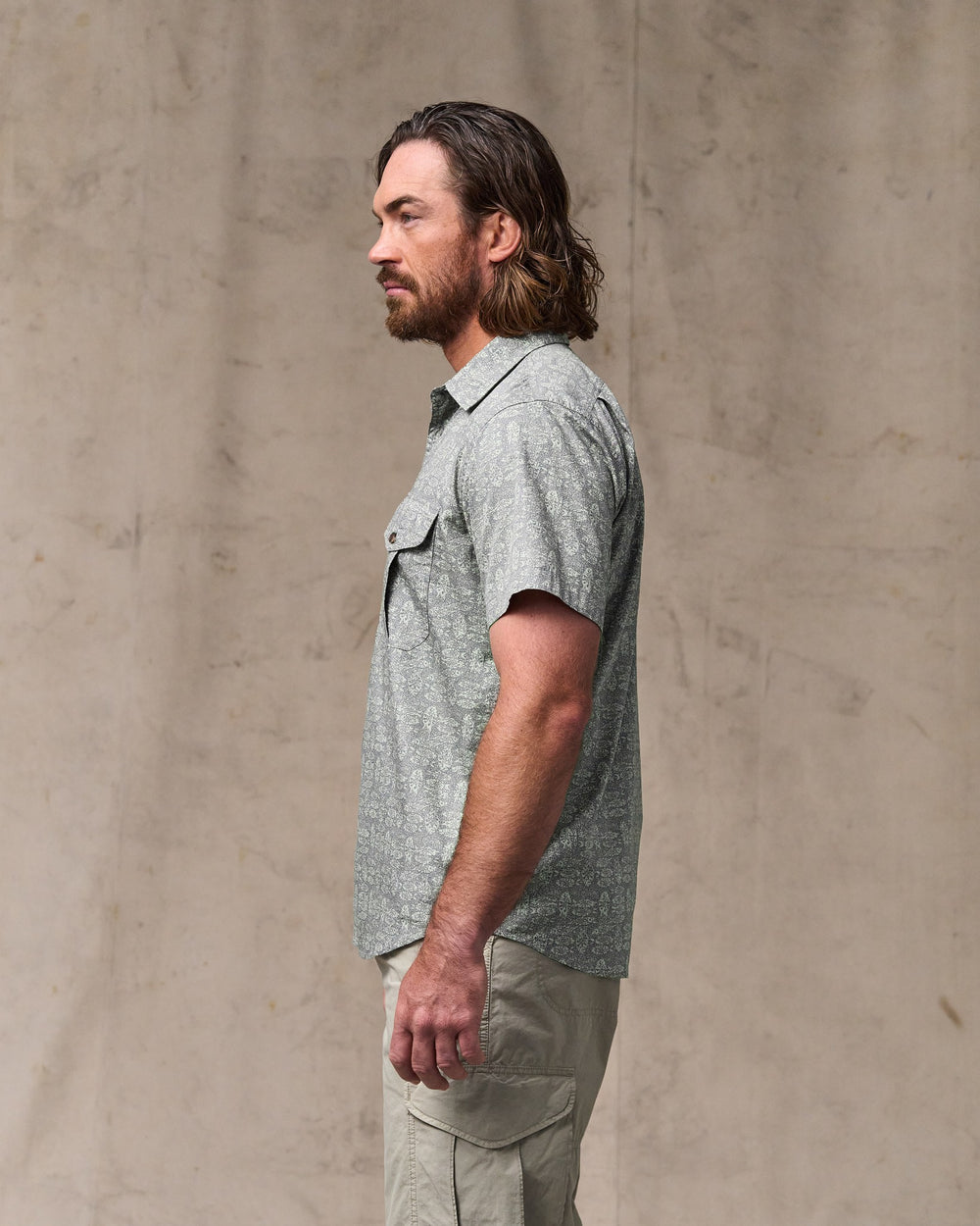 image of a model wearing Filson's Filson's Washed Short Sleeve Feather Cloth Shirt - Khaki / Print
