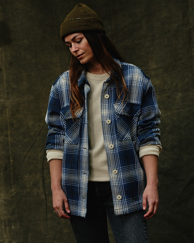 image of a model wearing Filson's Women's Deer Island Jac-shirt - Cobalt / Natural Shadow Plaid