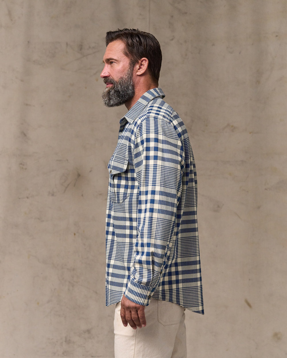 image of a model wearing Filson's Lightweight Alaskan Guide Shirt - Indigo Multi Plaid