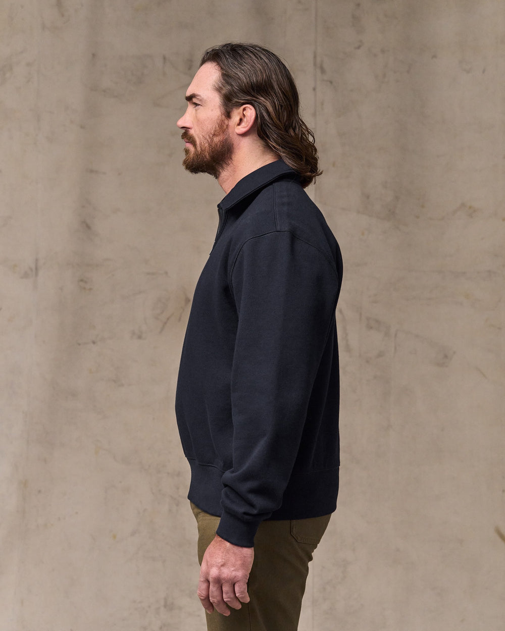 image of a model wearing Filson's 14-oz. Heritage Fleece Quarter Zip - Dark Indigo