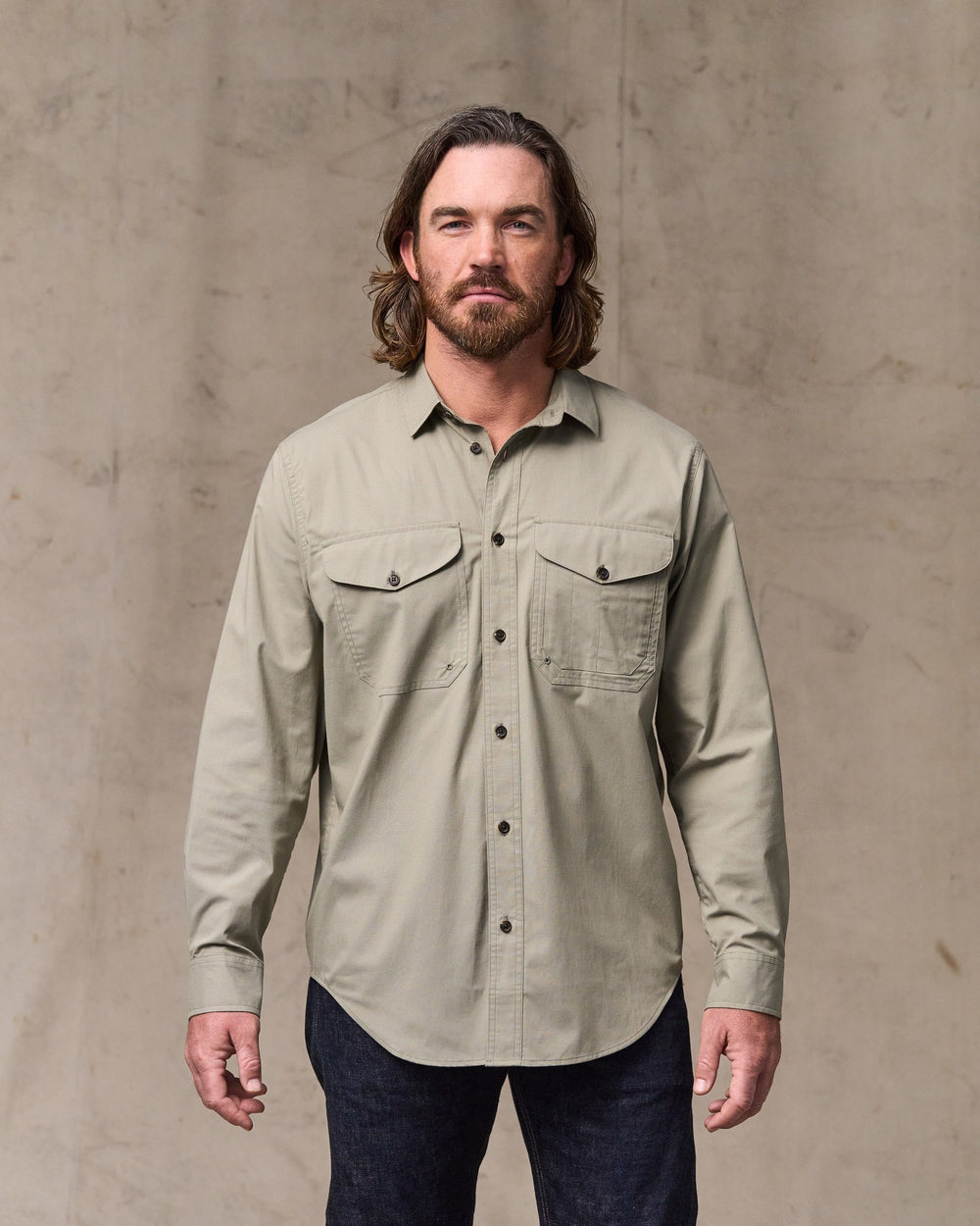 image of a model wearing Filson's Twin Lakes Sport Shirt - Dark Clay