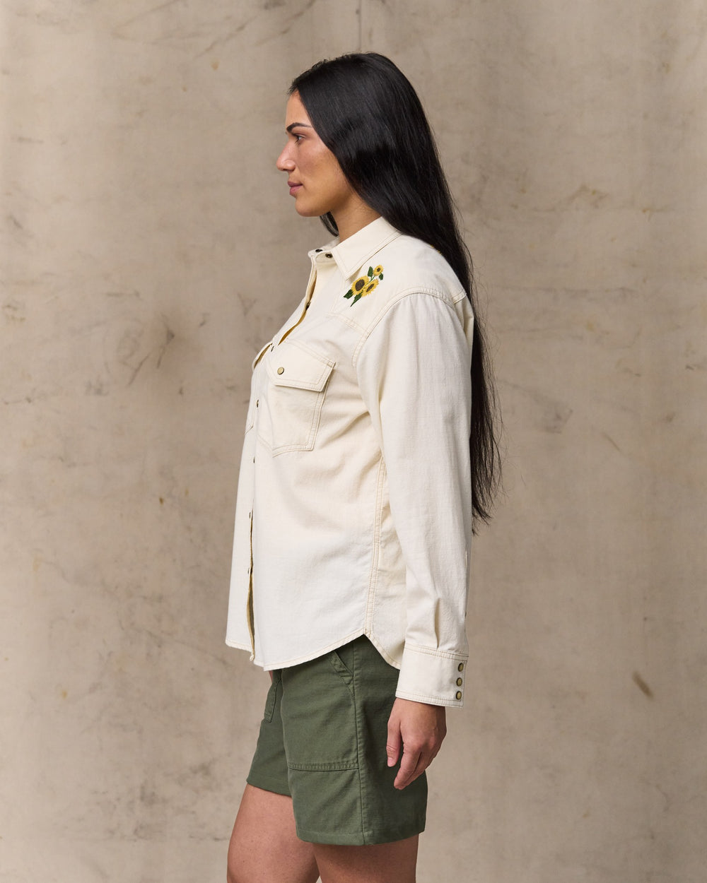 image of a model wearing Filson's Women's Embroidered Western Shirt - Natural Seed