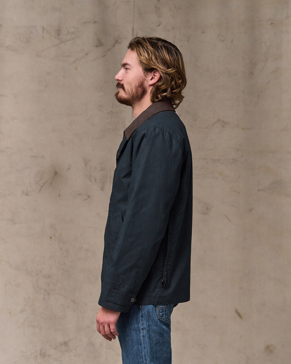 image of a model wearing Filson's Dry Wax Short Field Jacket - Navy