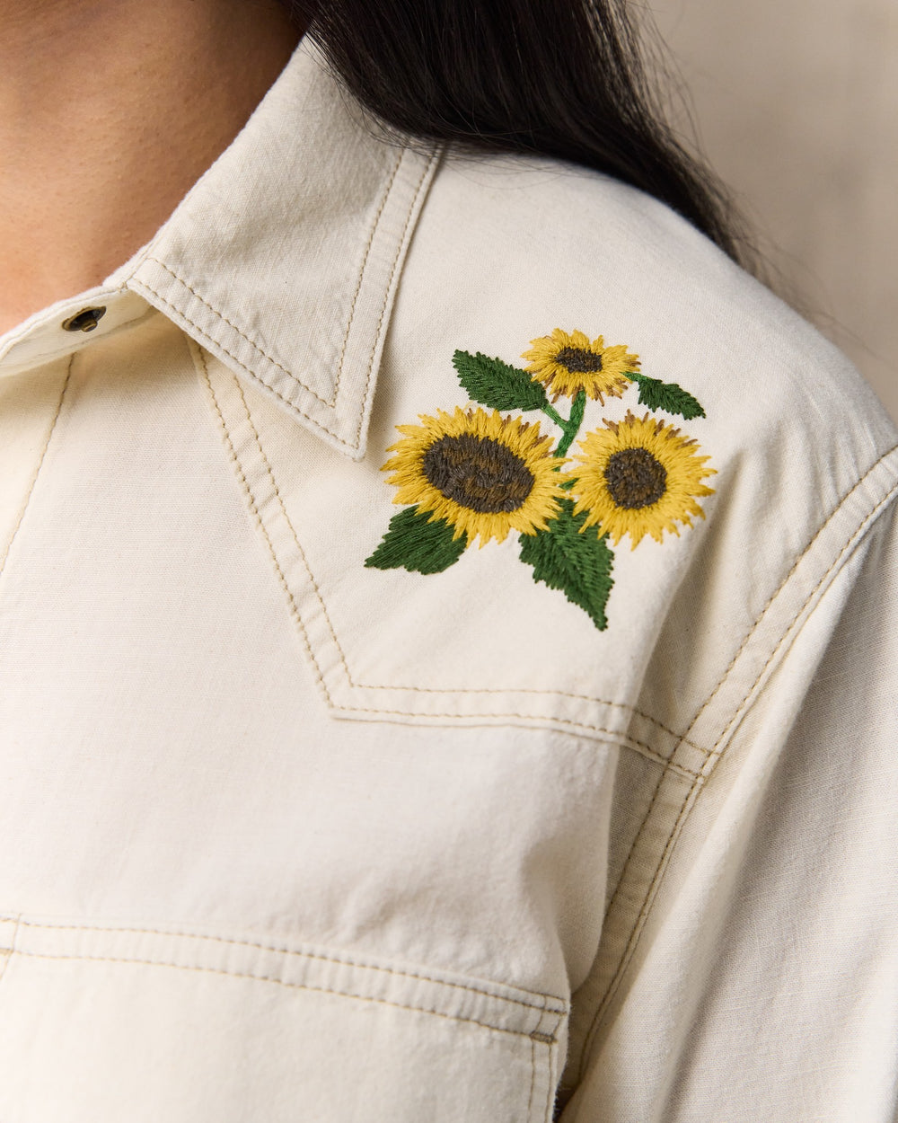 image of a model wearing Filson's Women's Embroidered Western Shirt - Natural Seed