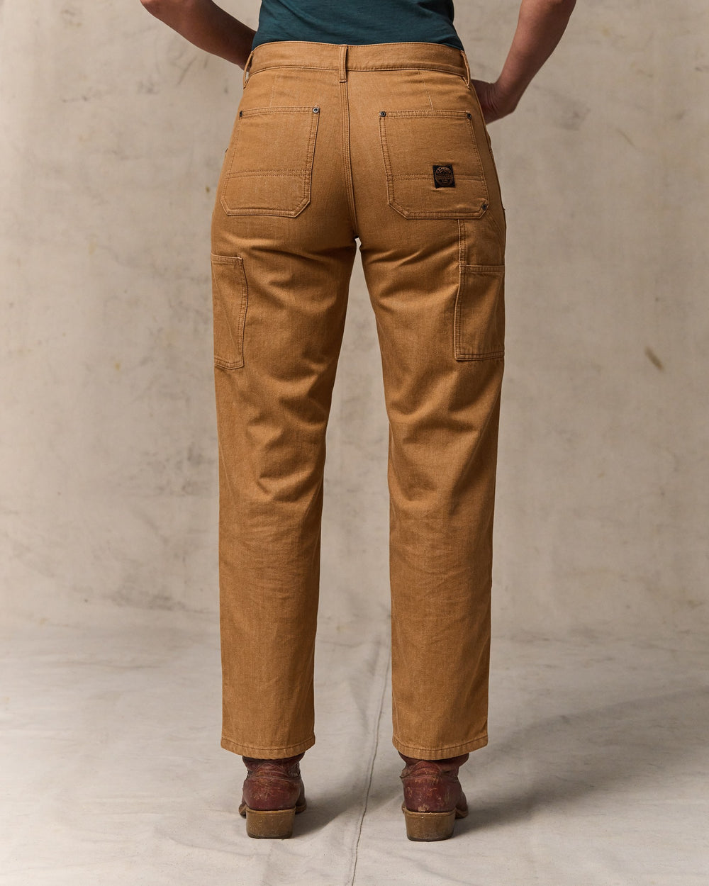 image of a model wearing Filson's Women's 11-oz. Work Jeans - Harvest Tan
