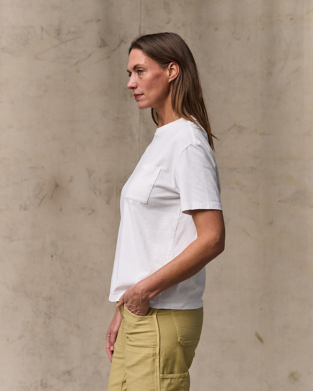 image of a model wearing Filson's Women's Short Sleeve Pocket Tee - Bright White