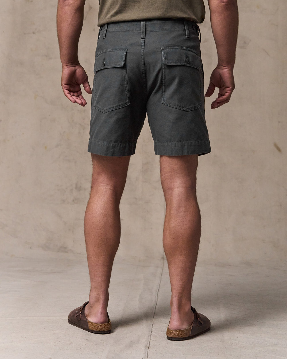 image of a model wearing Filson's Field Supply Shorts - Washed Faded Black